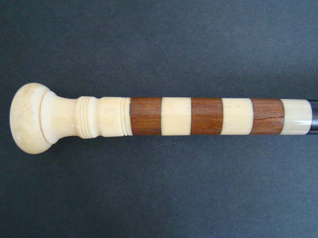 A fabulous Whale Ivory mounted Walking Stick with Ebony shaft circa 1850-1860